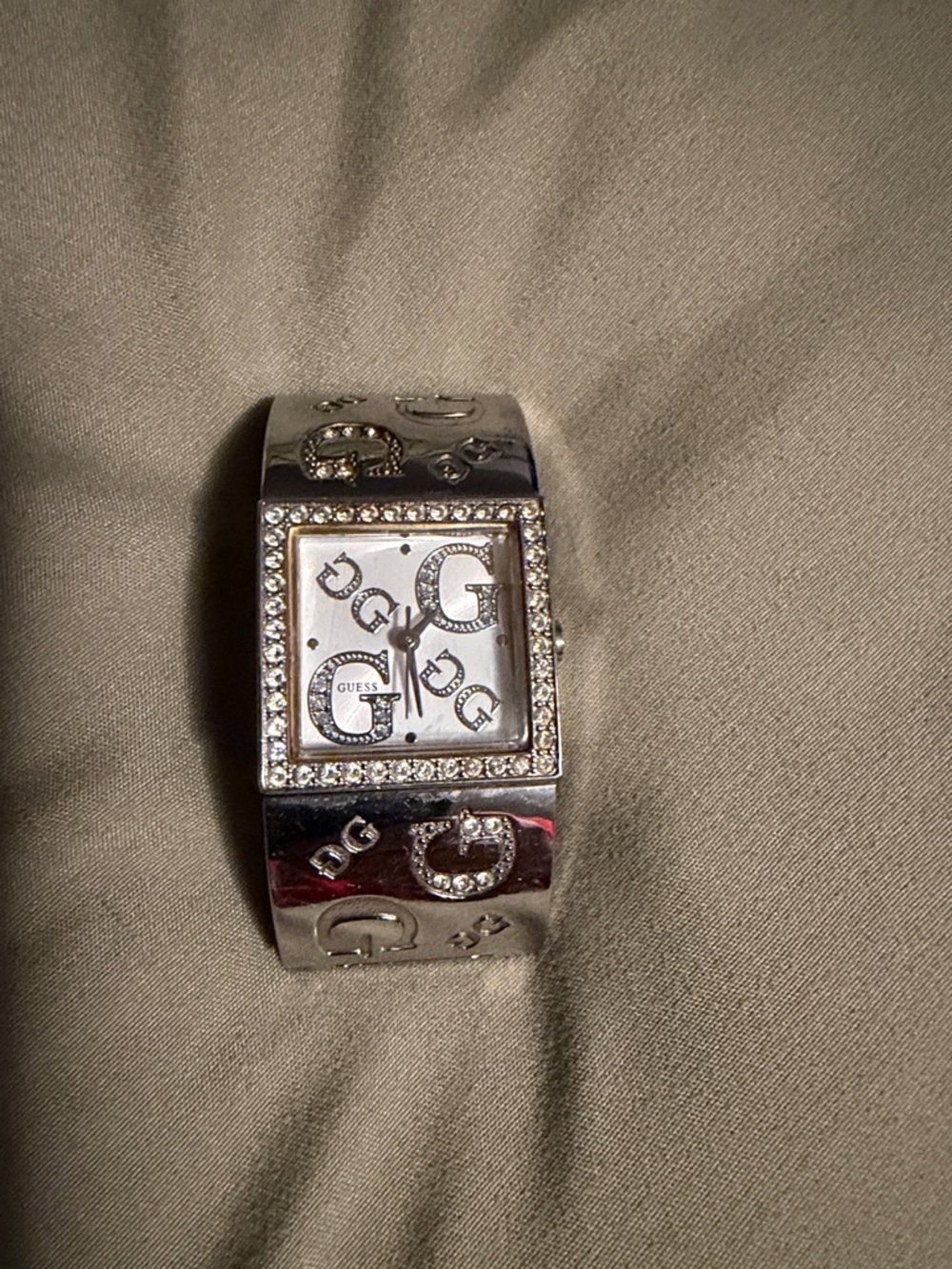 Guess Silver-tone Crystal Emblem Bangle Watch